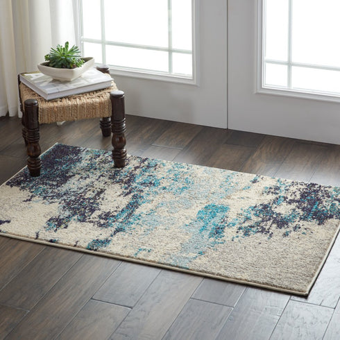 2' X 4' Ivory And Teal Blue Abstract Power Loom Non Skid Area Rug
